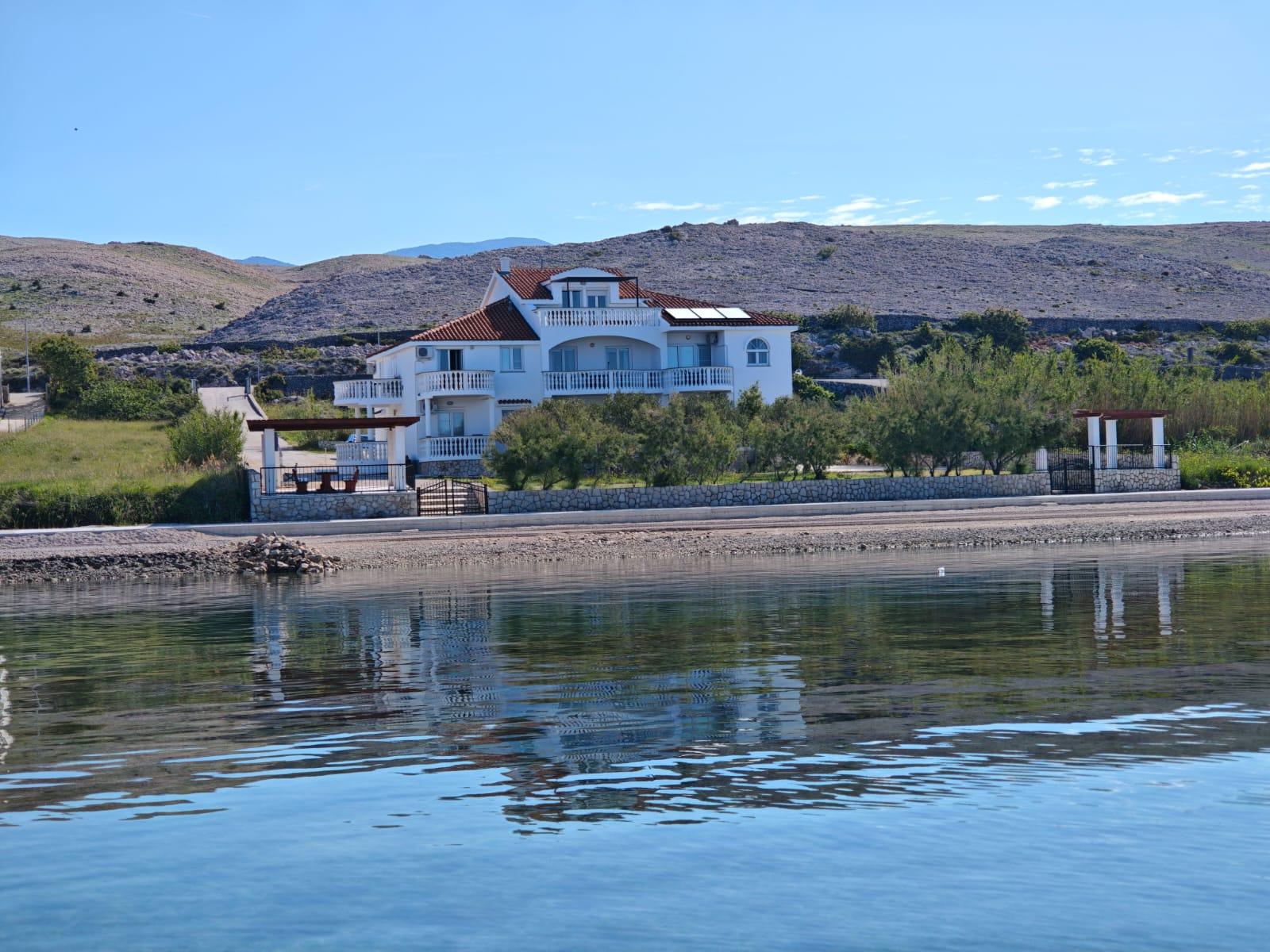 Villa Maestral seen from the water, Pag bay